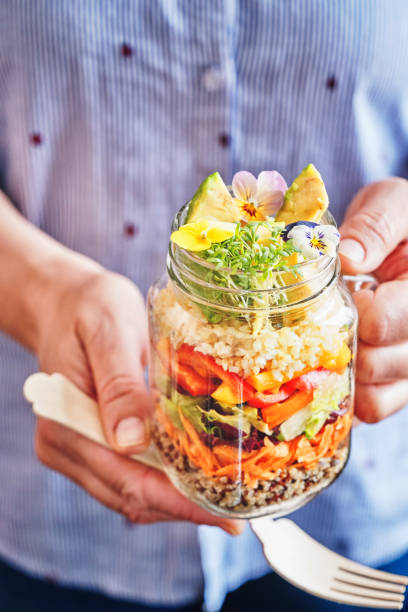 Bulgur Salad with Paprika, Cucumber, Onion, Carrots and Lettuce served in a Jar